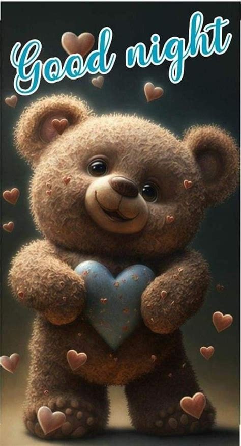 teddy bear holding  heart   words good night written  blue
