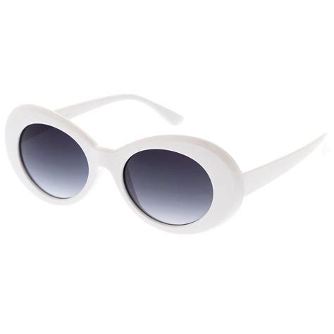 retro white oval sunglasses with tapered arms neutral colored gradient