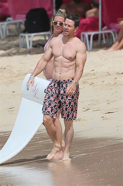 mark wahlberg displays his six pack in barbados daily mail online
