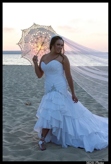 hopes bride jessica decided  hem  gown  create  high  wedding dress   beach