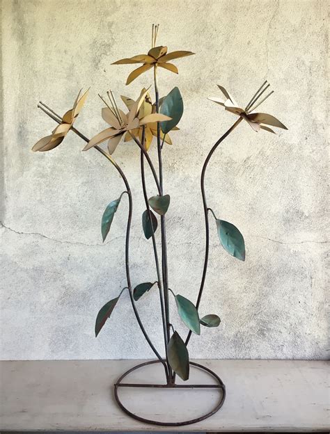 vintage chippy painted rusty metal flowers yard art garden decor