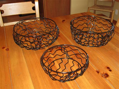 metal fruit bowls    steel rods   wrapped   wire jig