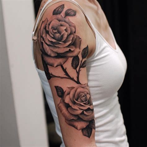 roses with branches on upper arm rose tattoos rose tattoo on arm