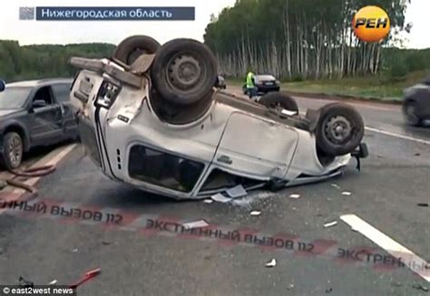 shameful russian car passenger filmed dancing and posing next to dead