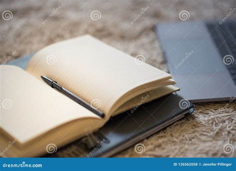 closeup   warmly lit journal lying open  pages open  stock