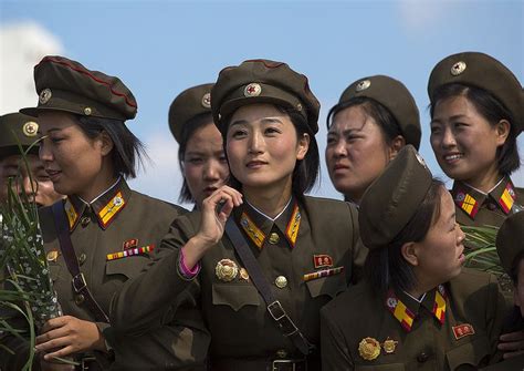 Smiling North Korean Female Soldiers In Tower Of The Juche Idea