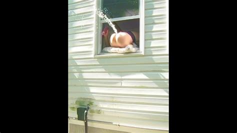 horny dildo orgasm squirting out of window while neighbors