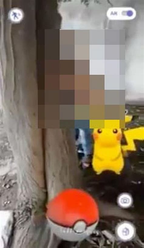 pokemon go player stumbles into randy couple having sex behind tree while playing popular game