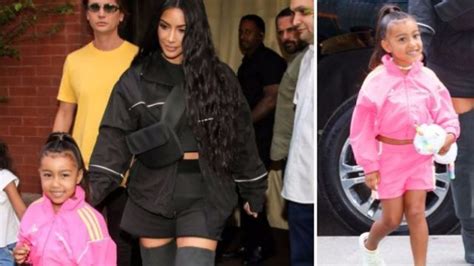 north west wears hair extensions to sweet shop with kim kardashian