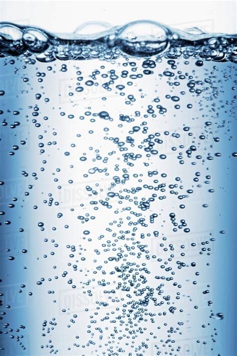 air bubbles rising  water close  stock photo dissolve