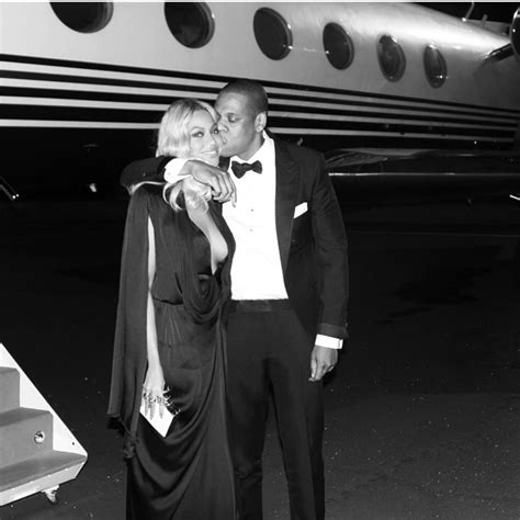 jay z planted a kiss on his wife during a night out in las