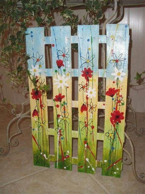 pallet painted gate decoration  flowers green grass  sky