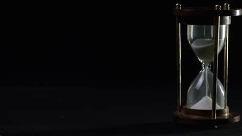 Hourglass Isolated On Black Background Stock Video Footage Storyblocks