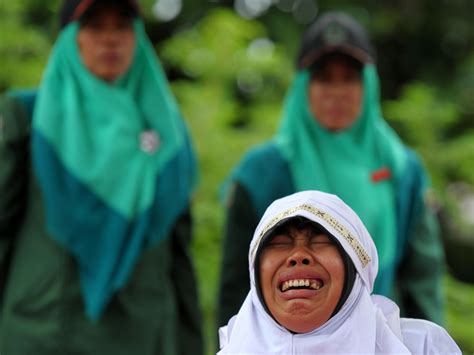 Woman Caned In Indonesia For Standing Too Close To Her