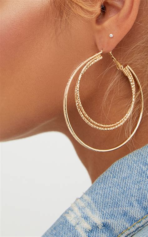 gold large double hoop earrings accessories prettylittlething usa