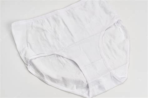 Premium Photo A White Cotton Panties On A White Background