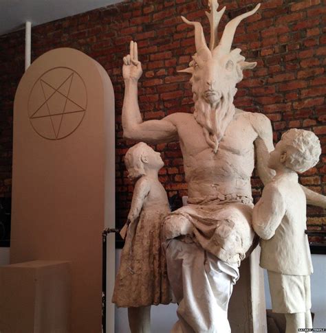 decoding the symbols on satan s statue bbc news