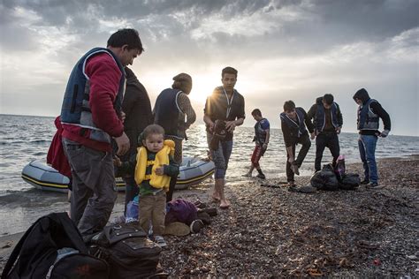 The Story Behind The Photos Of Syrian Refugees Escaping Along The