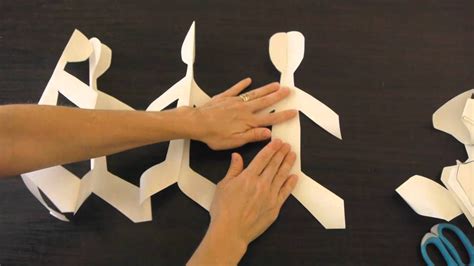 paper dolls holding hands paper dolls paper doll chain