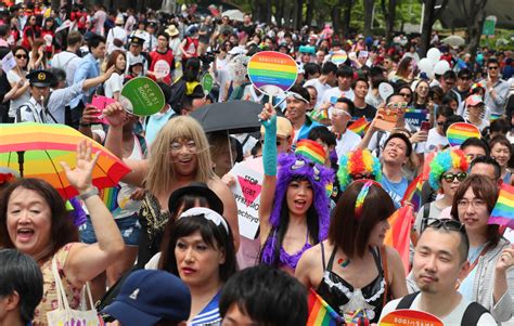 ahead of olympics tokyo passes law to end discrimination