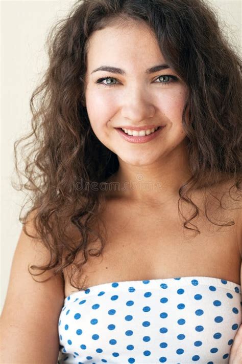 Portrait Of A Cute Brunette With Curls Stock Images Image 23465344
