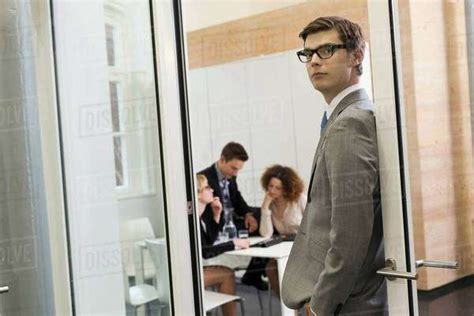 businessman standing  doorway stock photo dissolve