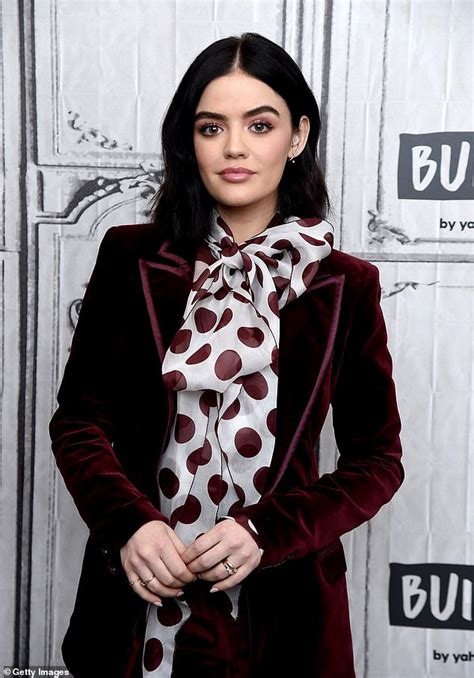 lucy hale embraces 70s chic glamour in a vintage inspired velvet suit