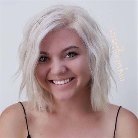 Platinum Blonde Layered Bob With Wavy Texture And Long