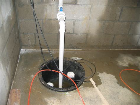 sump pump working  hard basement waterproofing