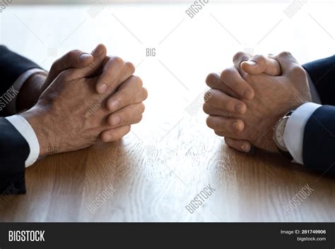 clasped hands  image photo  trial bigstock