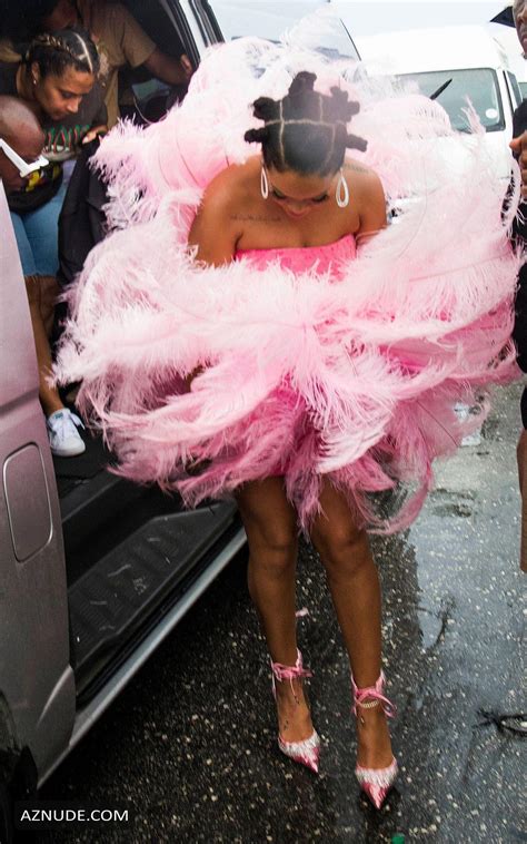 rihanna sexy in a pink dress during kadooment day parade in st