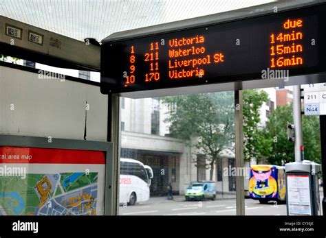 london england uk bus stop  times  buses due stock photo alamy