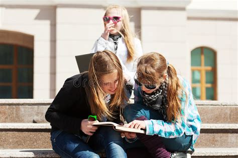 schoolgirls on a campus stock image image of outside