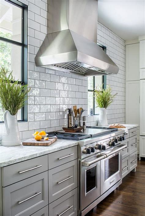 light gray kitchen cabinets  white  gray granite counters