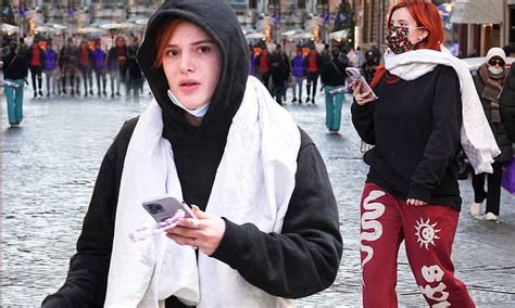 bella thorne puffs on a cigarette in rome while going under the radar