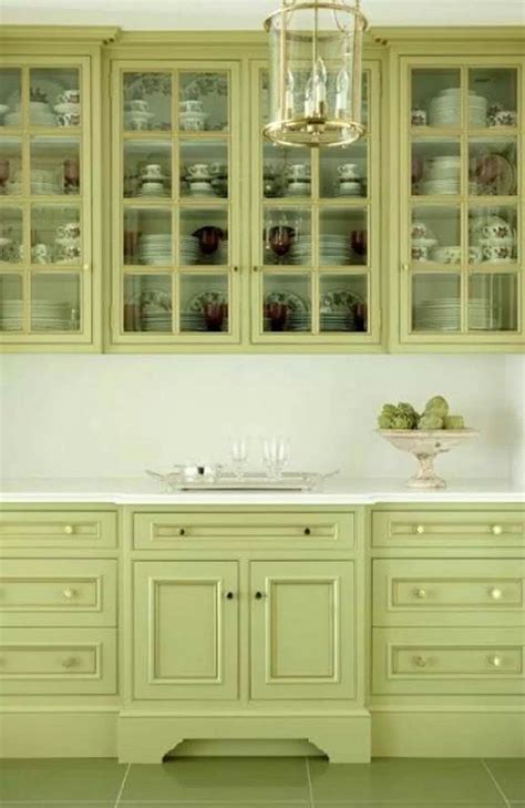 pin  ukelala      million dollars green kitchen cabinets