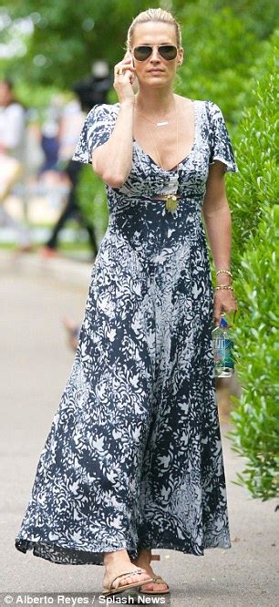molly sims sports eye catching dress for day out with son brooks