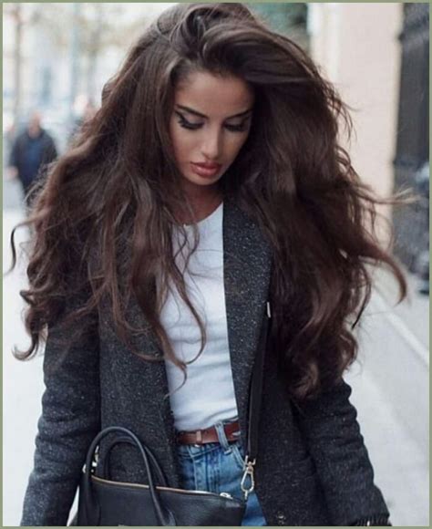 raven haired beauty curly hair trends winter hair color