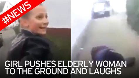 sickening moment teenage girl pushes elderly woman to the ground as