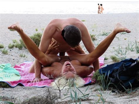 lucky guy gets to fuck a true horny wild amateur blonde babe public sex on the beach beach boobs