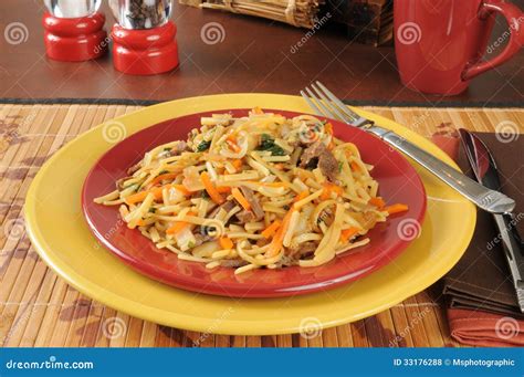 plate  beef chow mein stock photo image  carrots