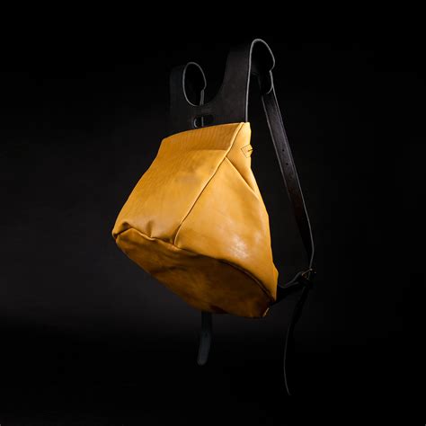 yellow black backpack pleathure touch  modern
