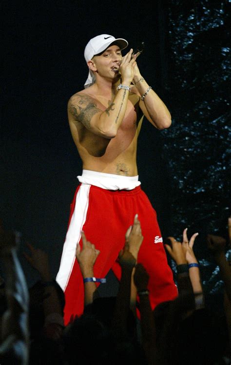 eminem stripped down to show off his shirtless body in 2002 blast