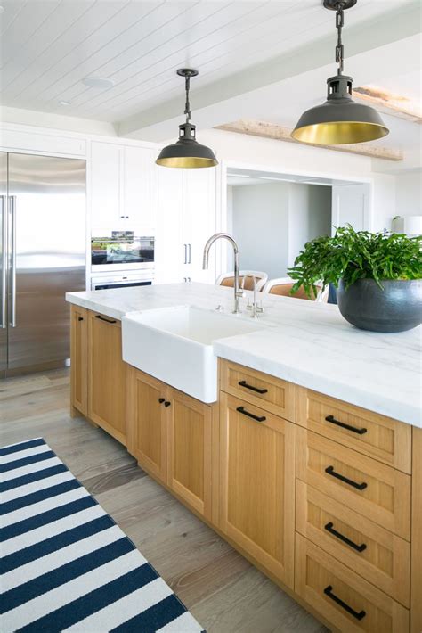 sandune bwd   maple kitchen cabinets white marble countertops white shiplap