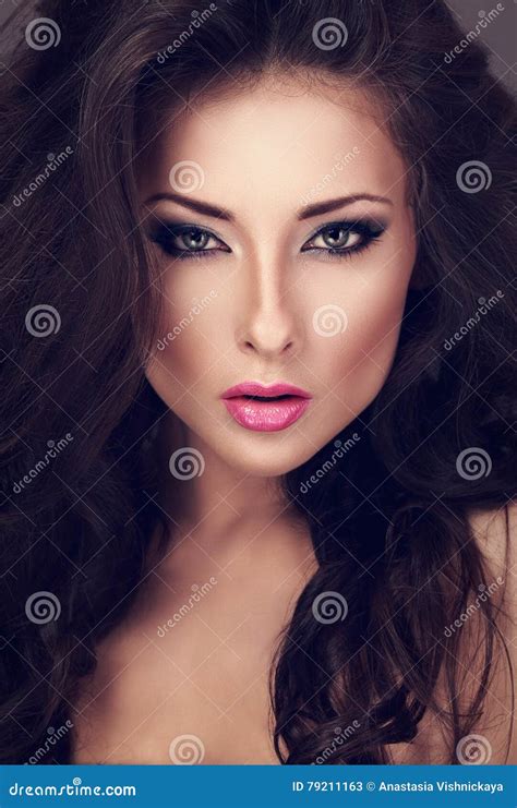 Beautiful Woman With Bright Smokey Makeup Eyes And Pink Lipstick Stock