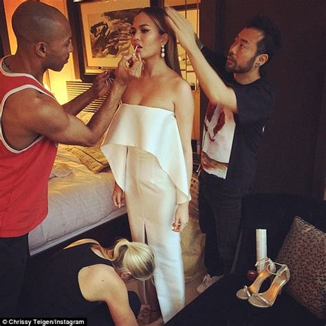 chrissy teigen wows in strapless white dress at cfda fashion awards