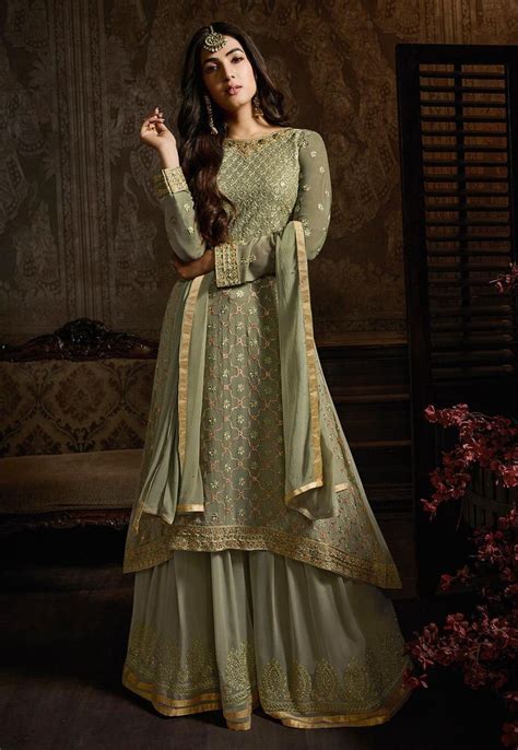 embroidered georgette pakistani suit in dusty green designer lehenga