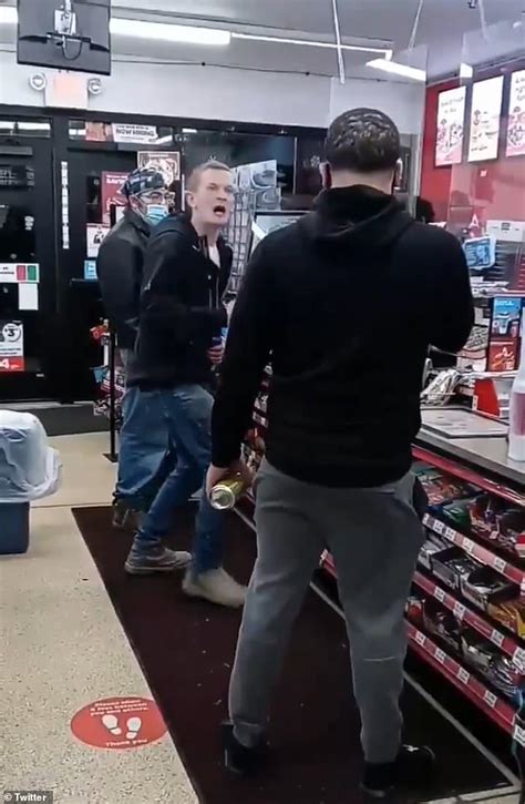 man slams a can of twisted tea into a racists head it bursts after he