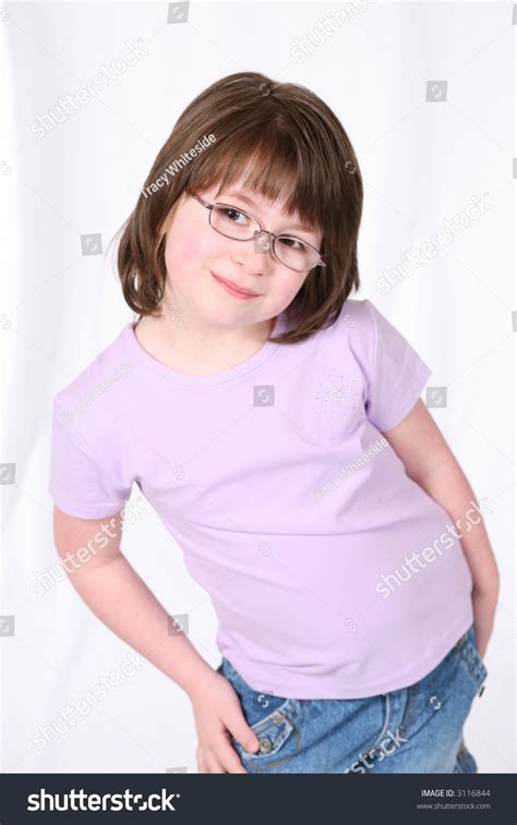Cute Little Brunette Girl Smiling And Wearing Glasses