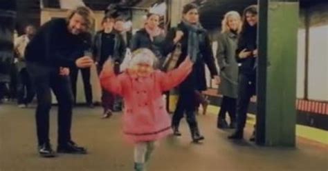 watch adorable girl leads dance party on subway platform